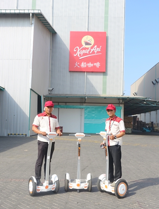 Airwheel scooters in Kapal Api coffee factory